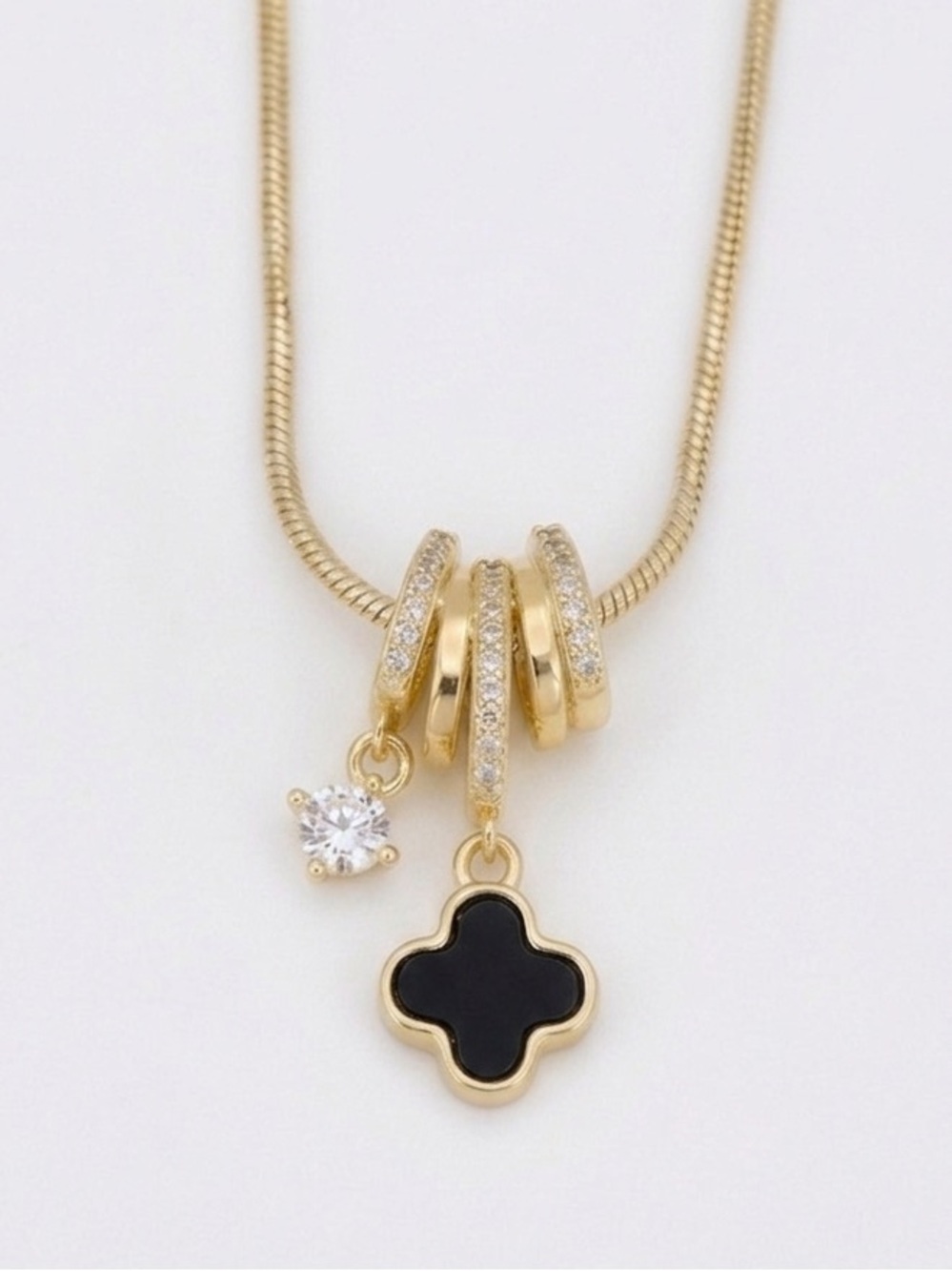 14K Gold Plated Smoky Black Clover Necklace | CZ Pavé Rings & Crystal Charm